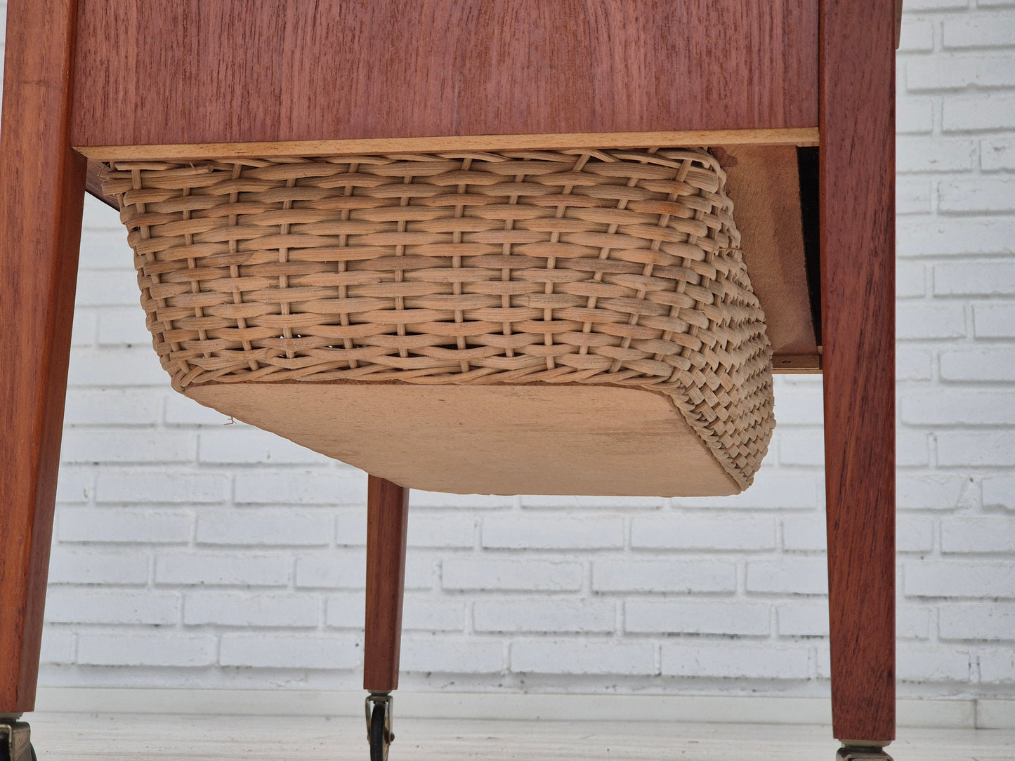 1970s, Danish side chest of drawers, teak wood, rattan, brass wheels, original condition.