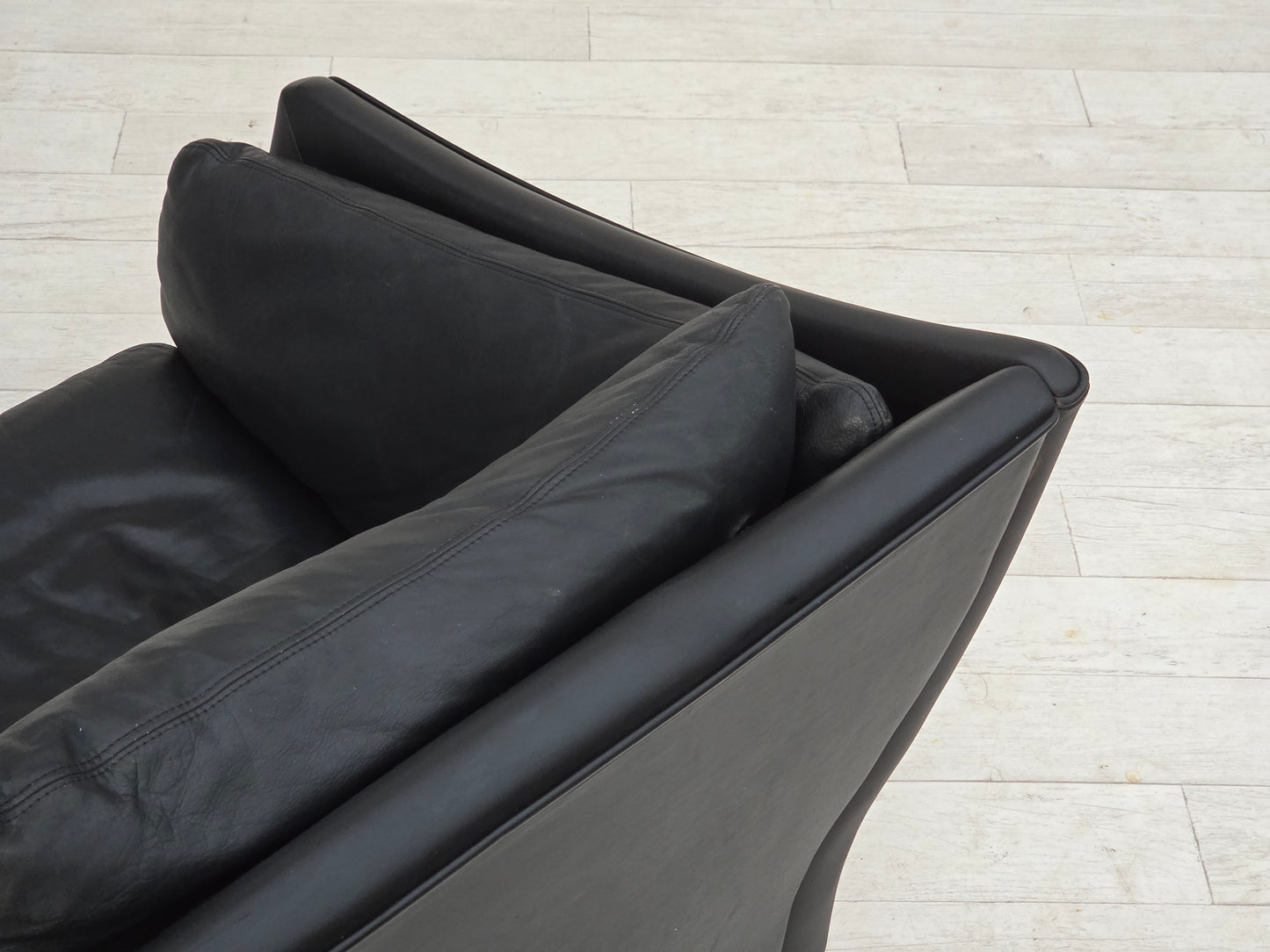 1970s, Danish 2-seater sofa, original black furniture leather, teak wood legs.