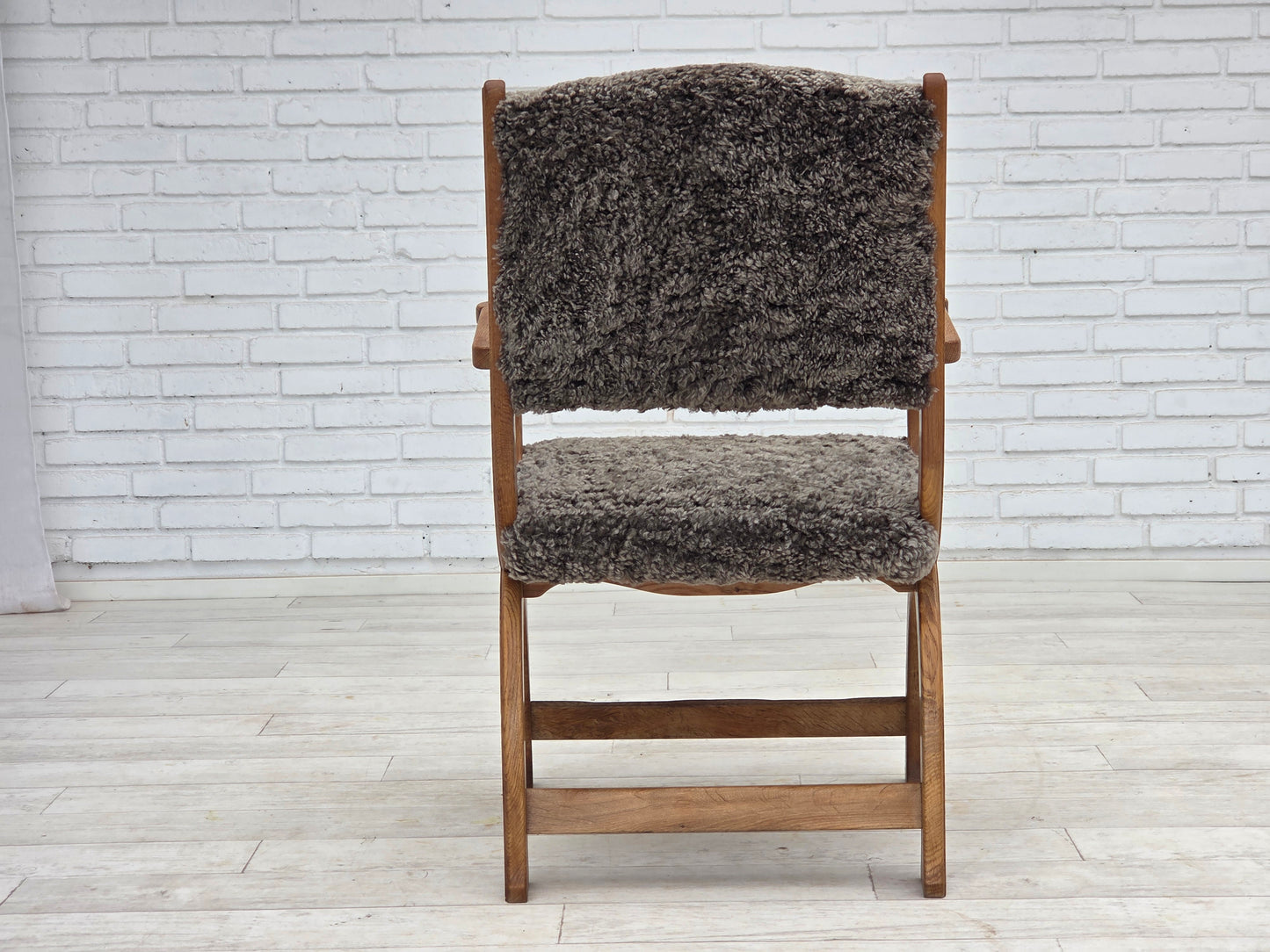 1970s, Danish lounge chair, genuine sheepskin "Wellington", oak wood.