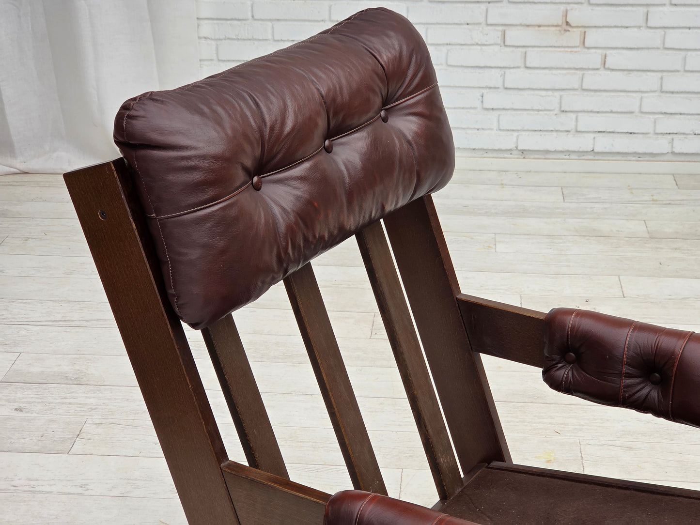 1970s, Scandinavian highback armchair, brown furniture leather, dark beech wood.