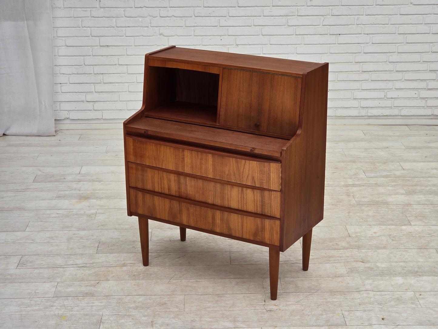 1970s, Danish chest of drawers with a folding mirror, teak wood.