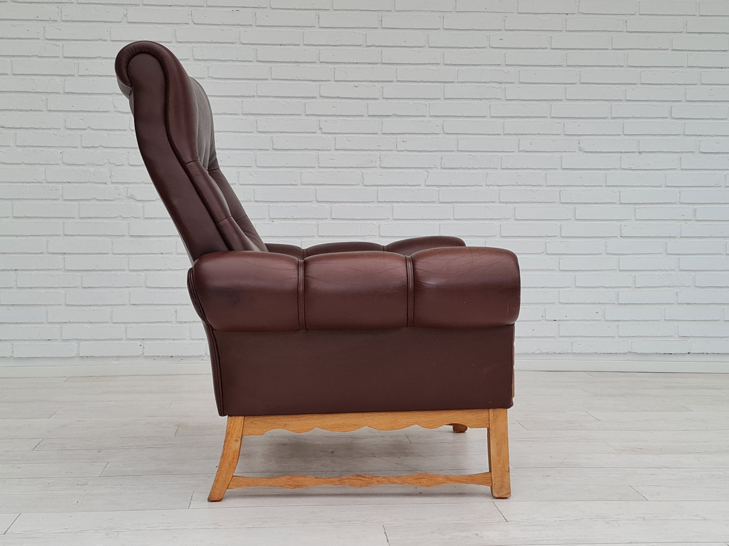 1970s, vintage Danish highback armchair, leather, oak wood.