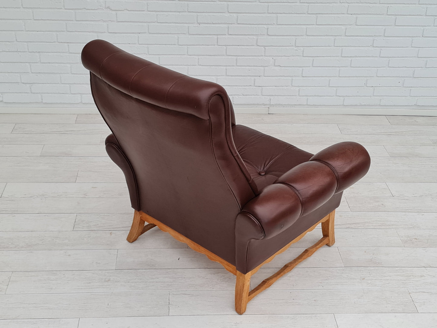 1970s, vintage Danish highback armchair, leather, oak wood.