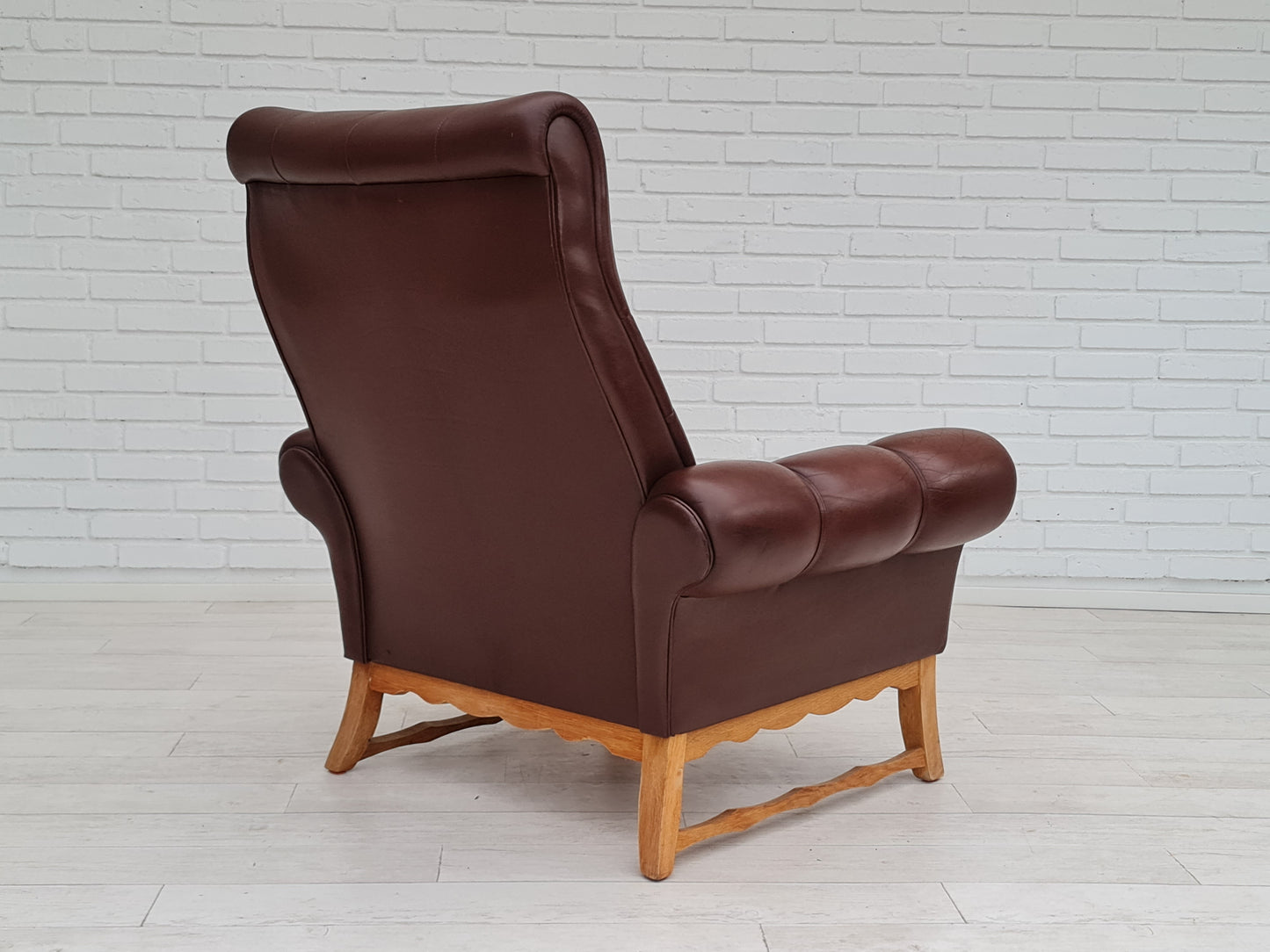 1970s, vintage Danish highback armchair, leather, oak wood.