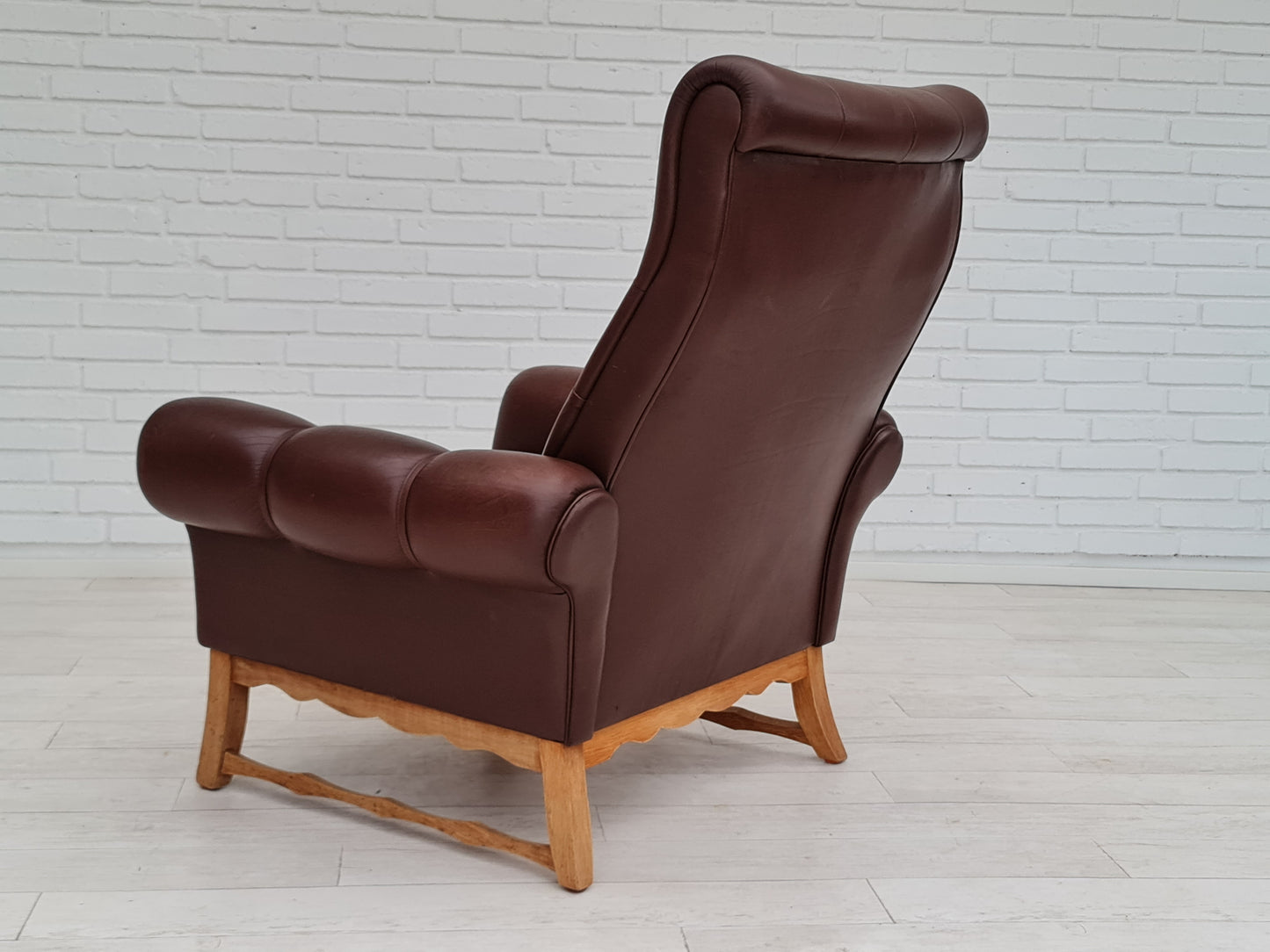 1970s, vintage Danish highback armchair, leather, oak wood.