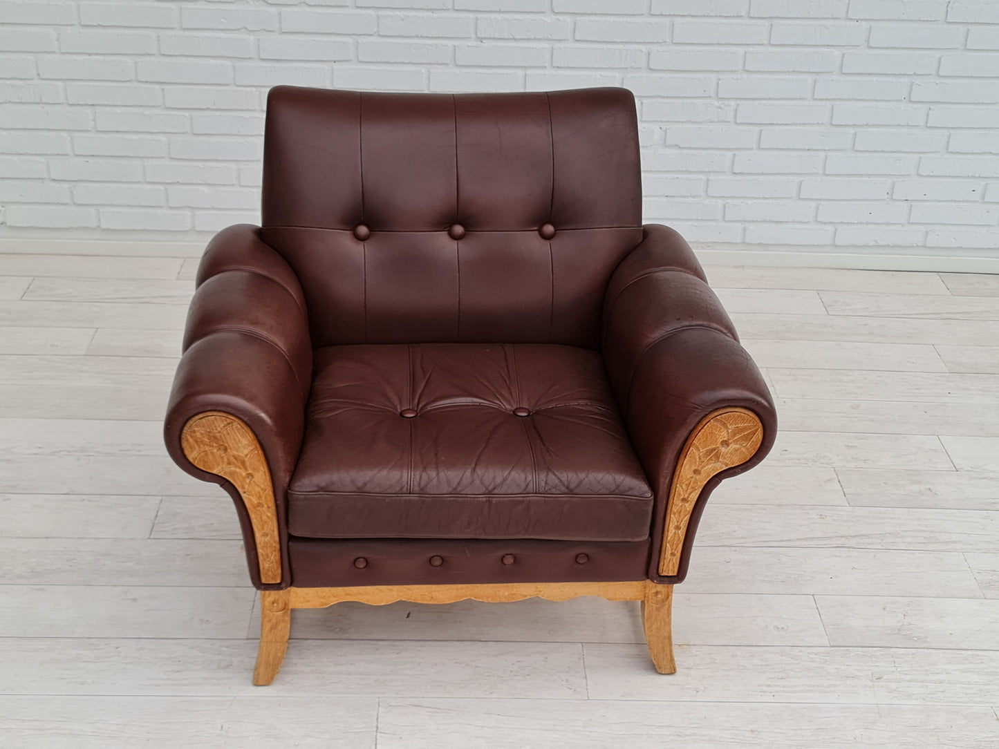 1970s, vintage Danish armchair, leather, oak wood, original condition.