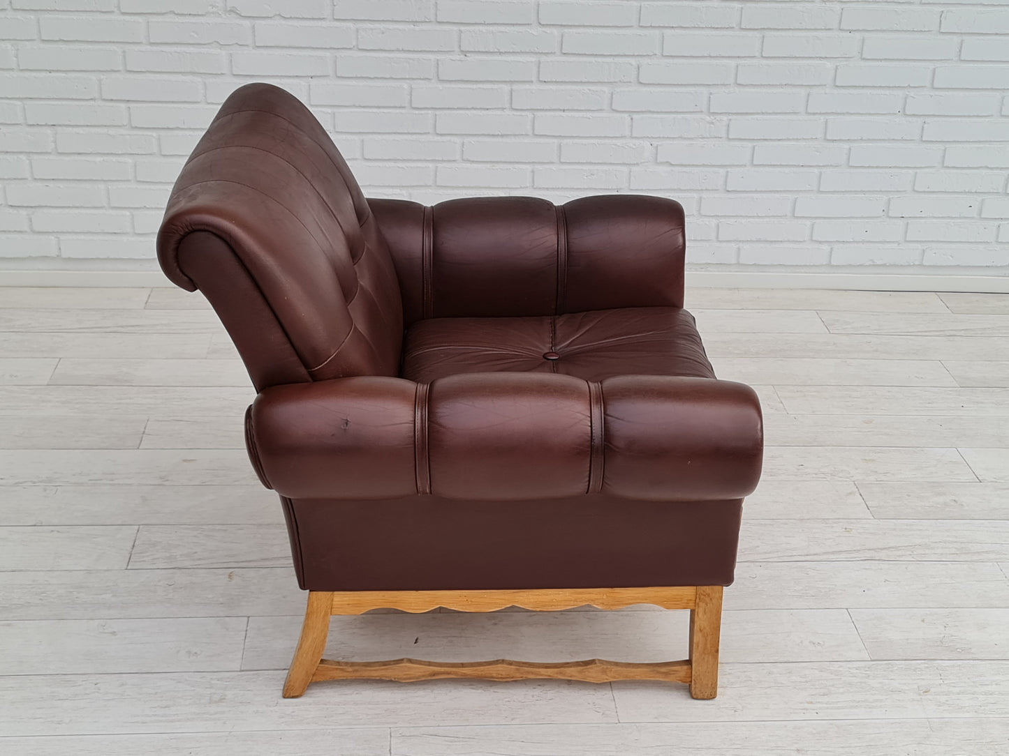 1970s, vintage Danish armchair, leather, oak wood, original condition.