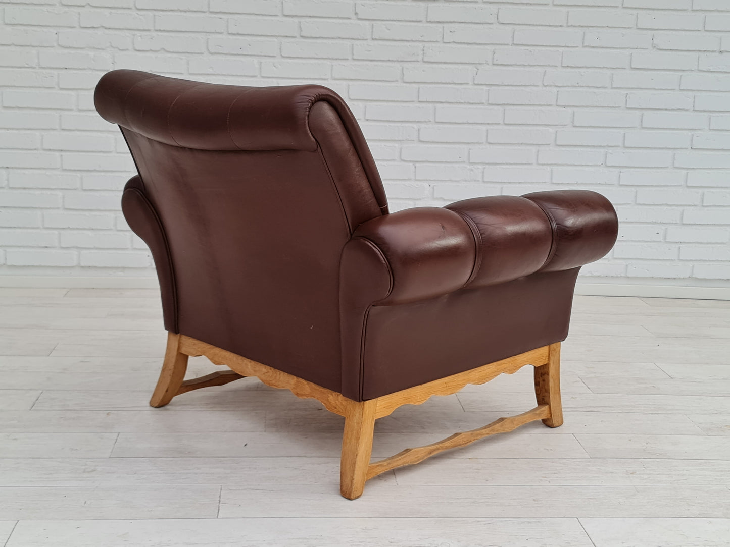 1970s, vintage Danish armchair, leather, oak wood, original condition.