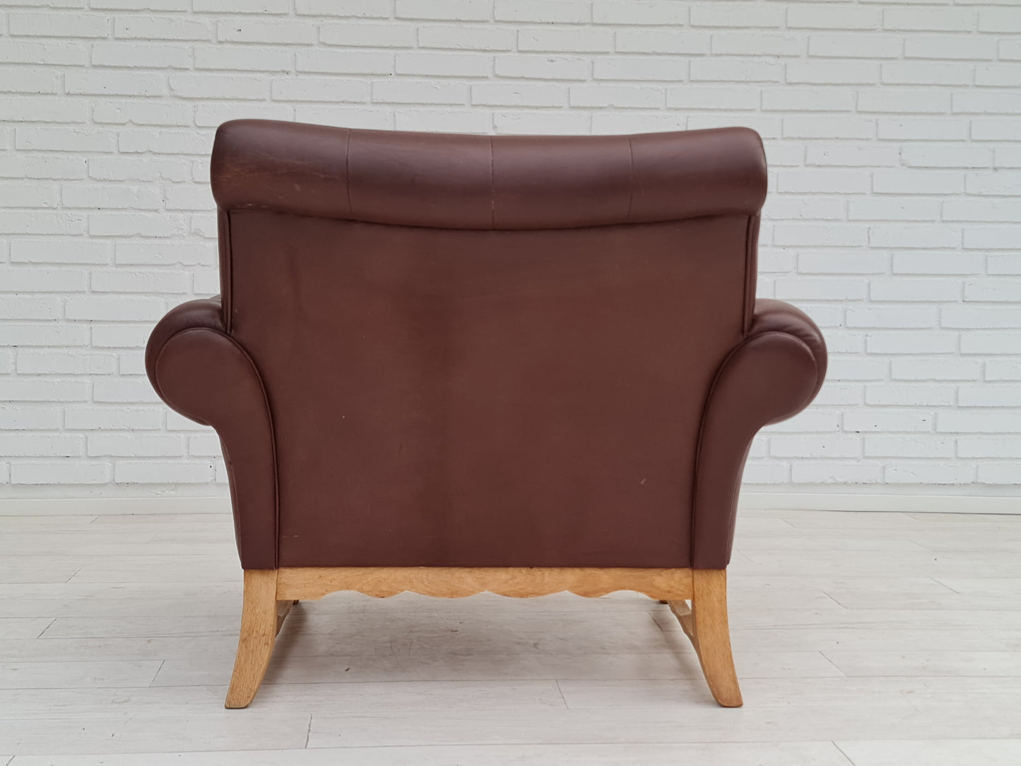 1970s, vintage Danish armchair, leather, oak wood, original condition.