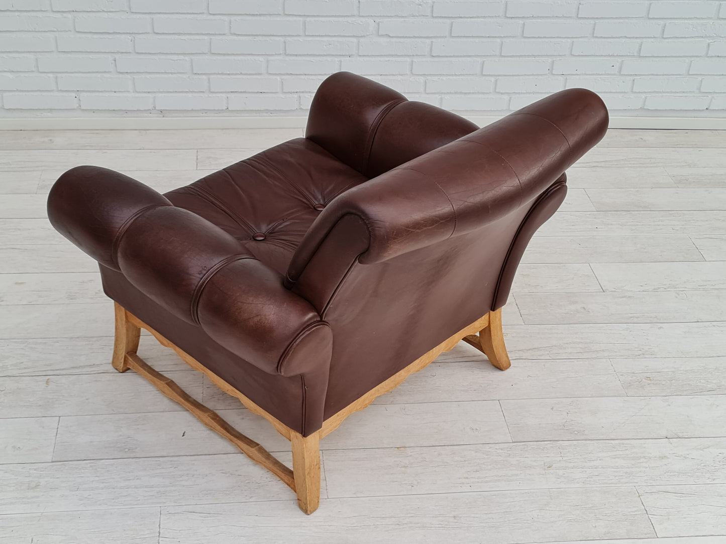 1970s, vintage Danish armchair, leather, oak wood, original condition.