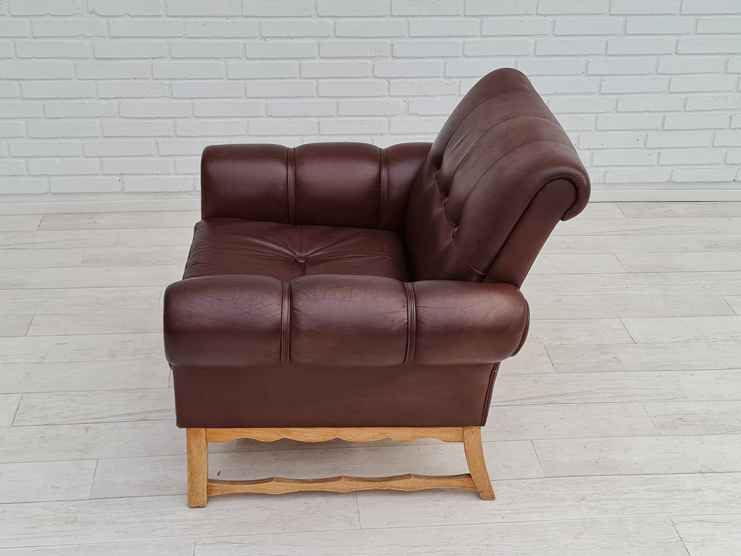 1970s, vintage Danish armchair, leather, oak wood, original condition.