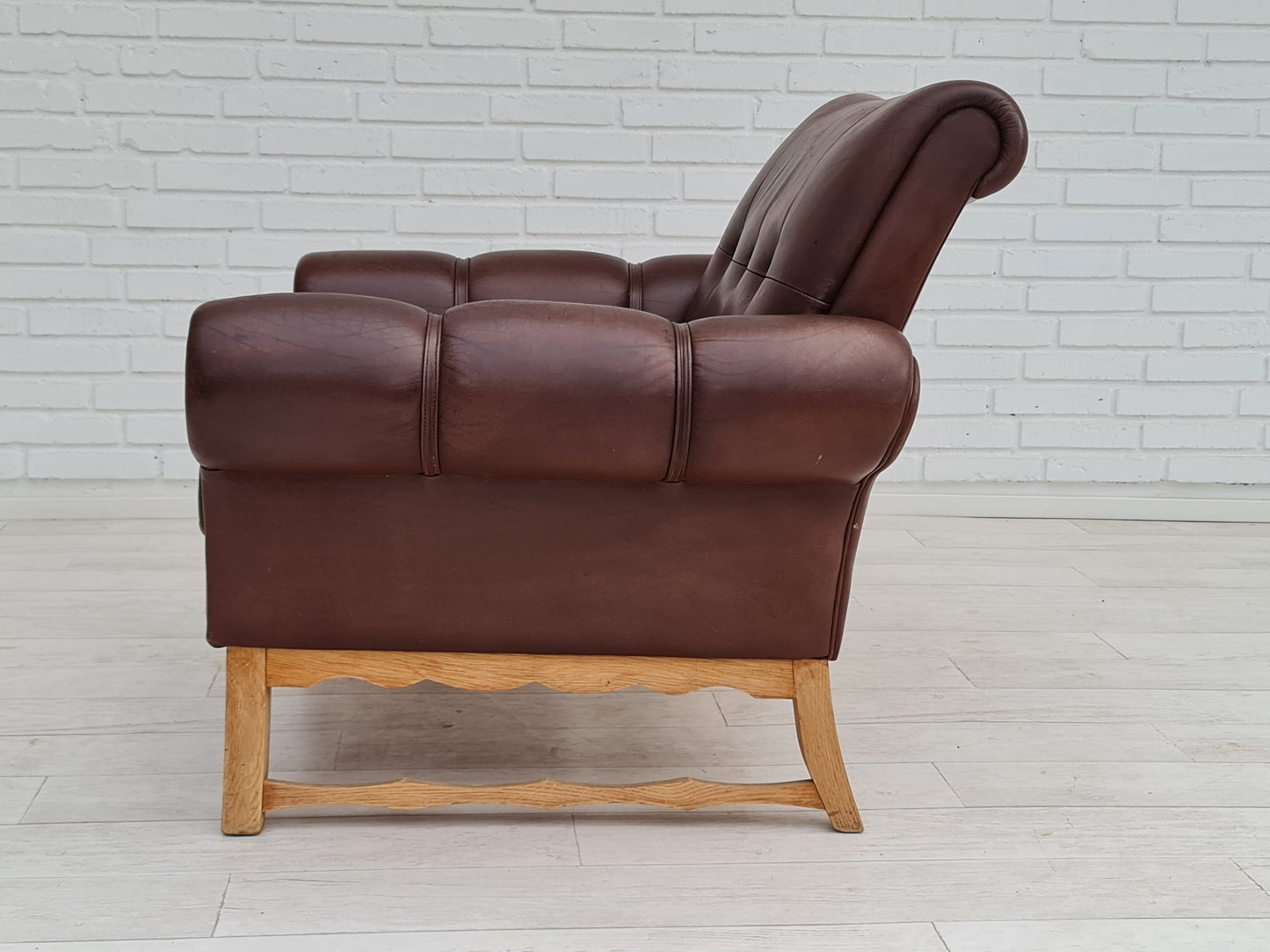 1970s, vintage Danish armchair, leather, oak wood, original condition.