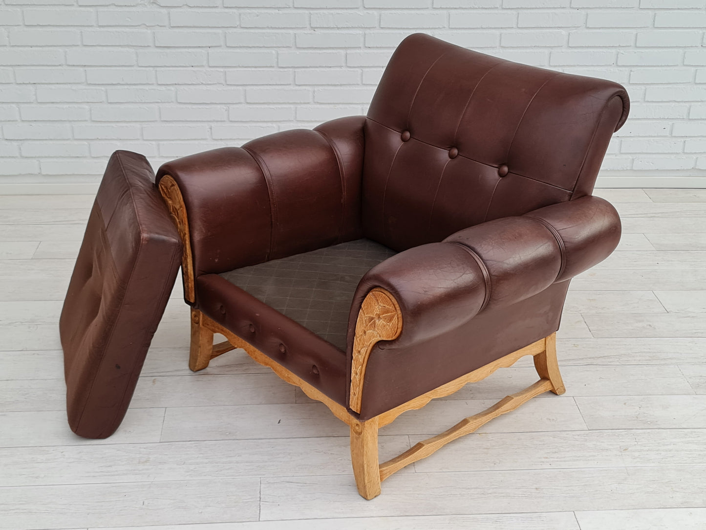 1970s, vintage Danish armchair, leather, oak wood, original condition.