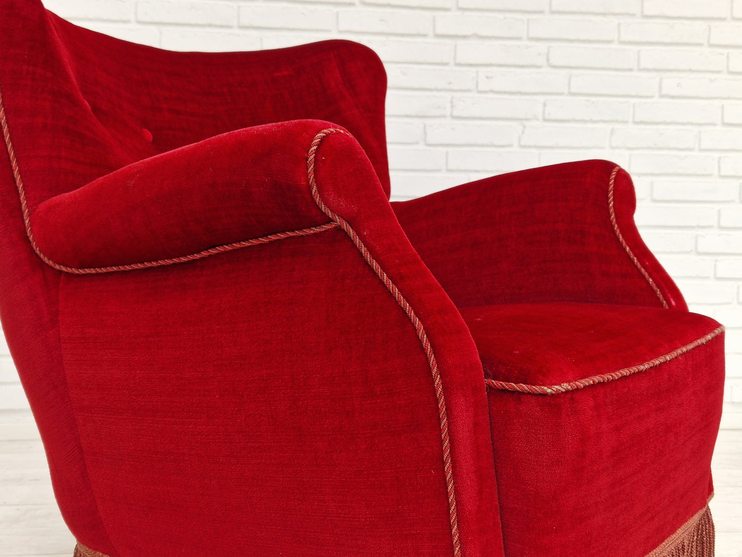 1960s, Danish vintage armchair in cherry-red velvet.