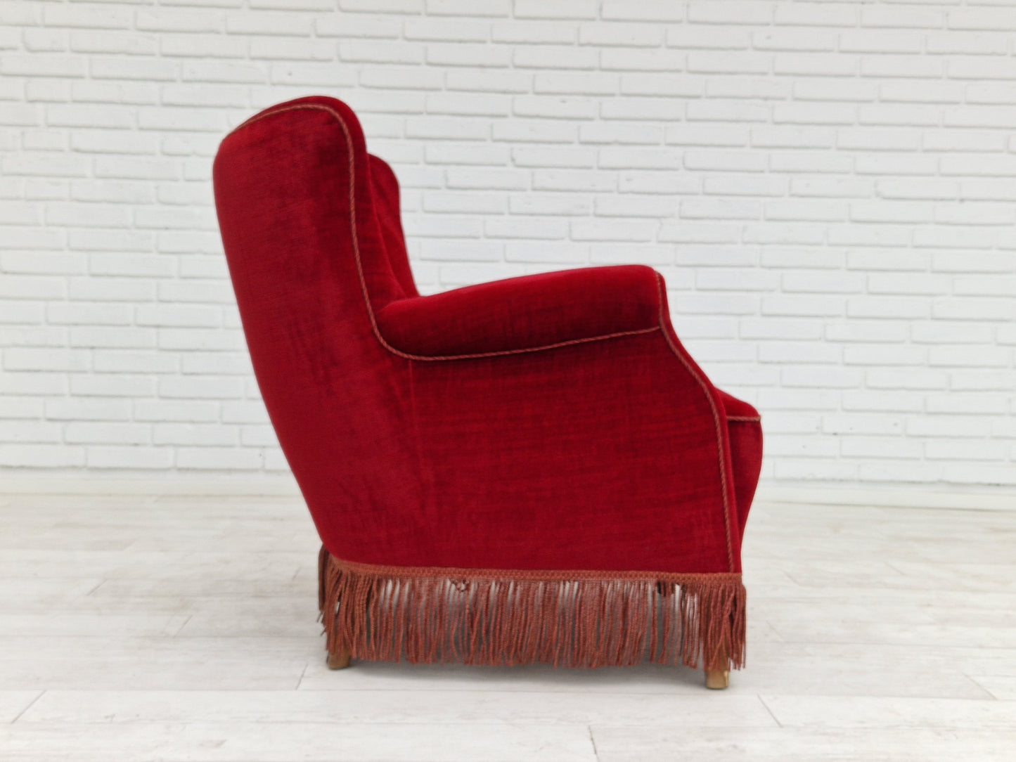 1960s, Danish vintage armchair in cherry-red velvet.