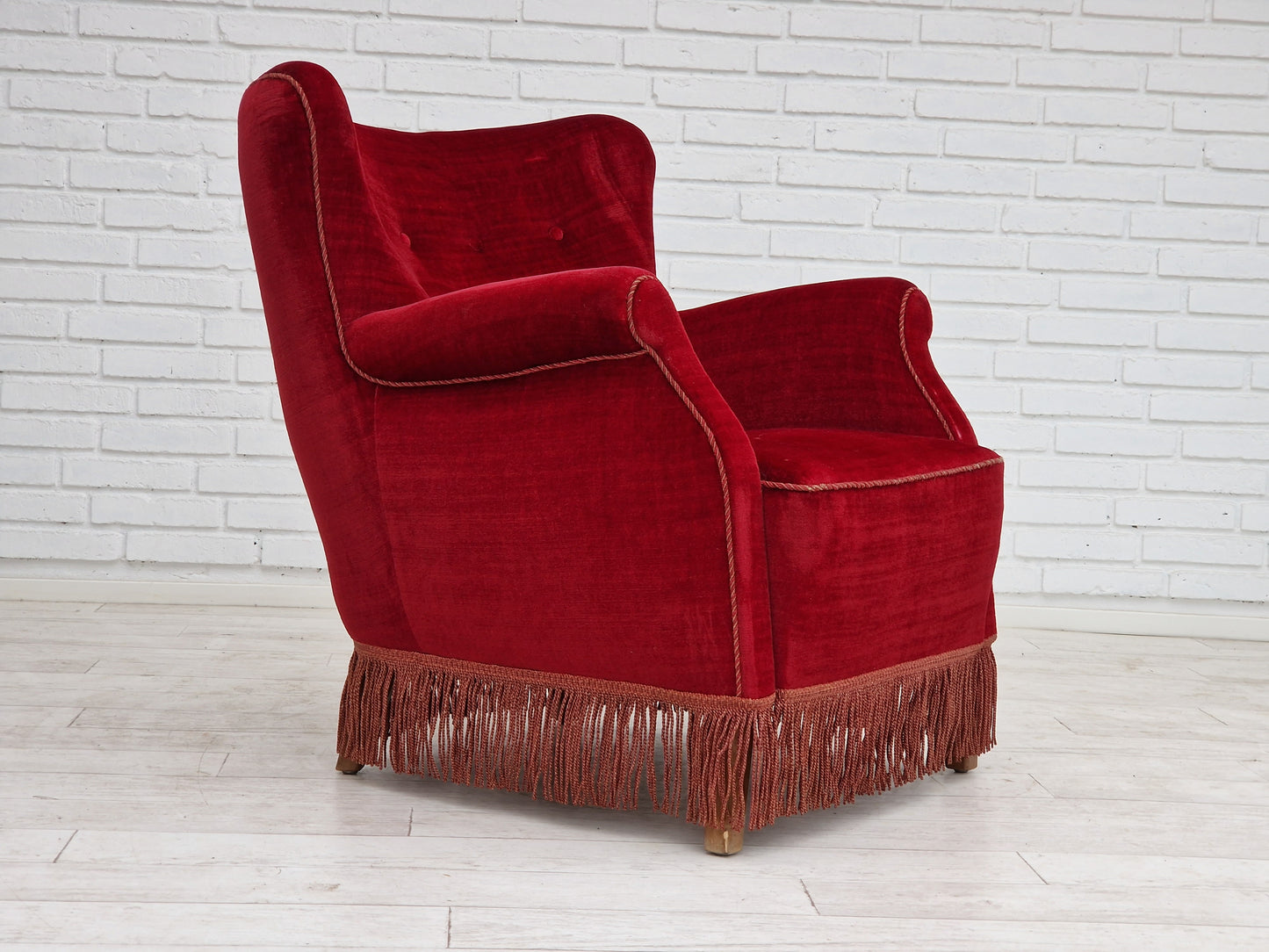 1960s, Danish vintage armchair in cherry-red velvet.