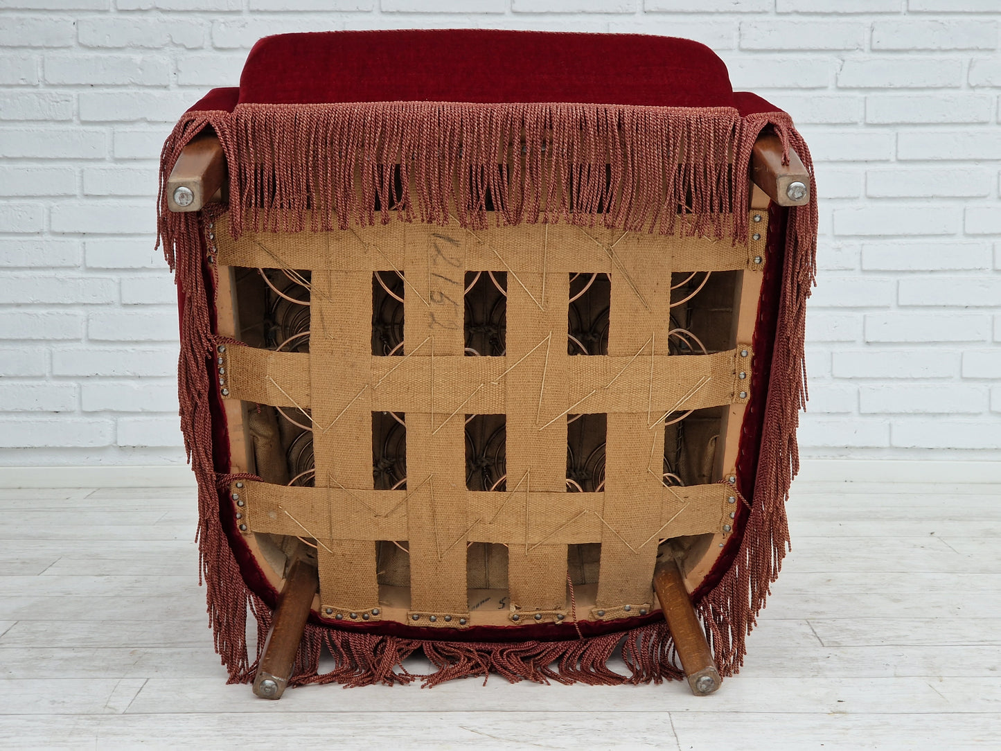 1960s, Danish vintage highback armchair in cherry-red velvet.