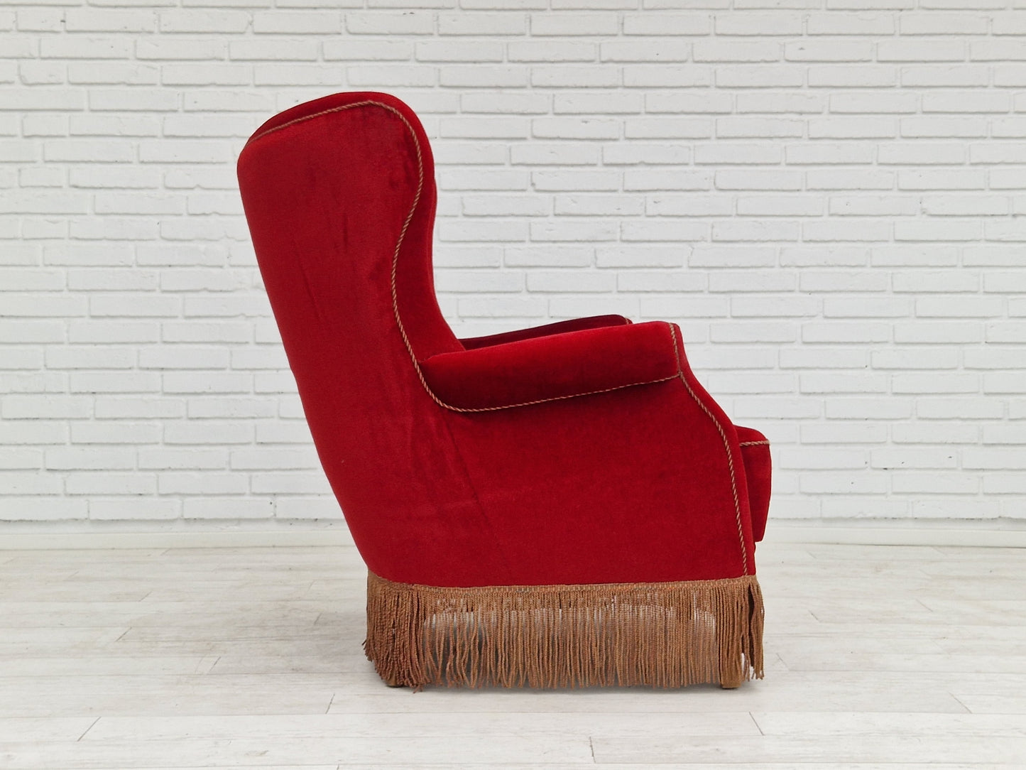 1960s, Danish vintage highback armchair in cherry-red velvet.