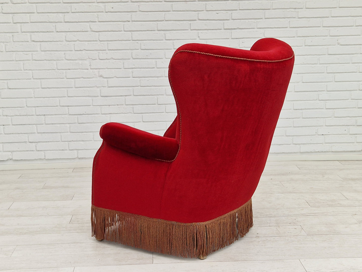 1960s, Danish vintage highback armchair in cherry-red velvet.