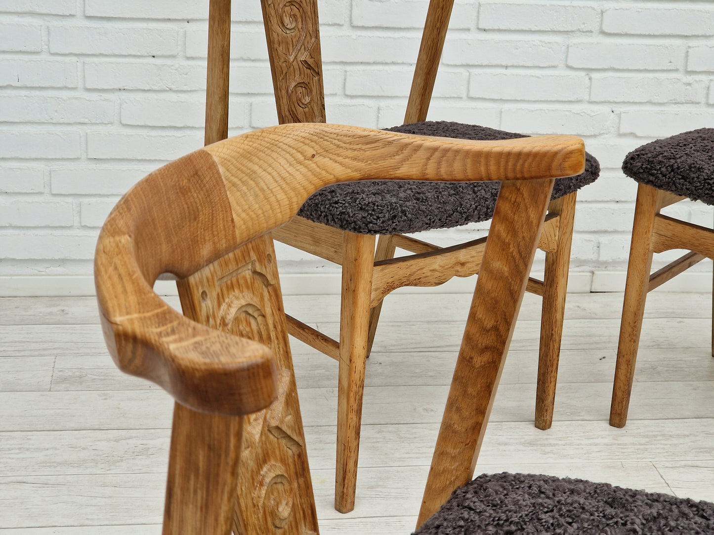 1960s, Danish design by Henning Kjærnulf, set of 4 dinning chairs, oak wood, sheepskin imitation.