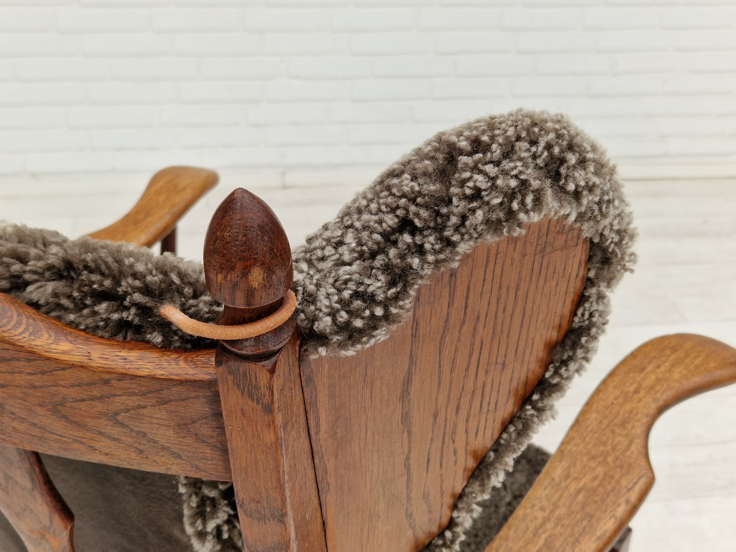 1960s, Danish design, renovated-reupholstered high-back ear flap chair, sheepskin, oak wood