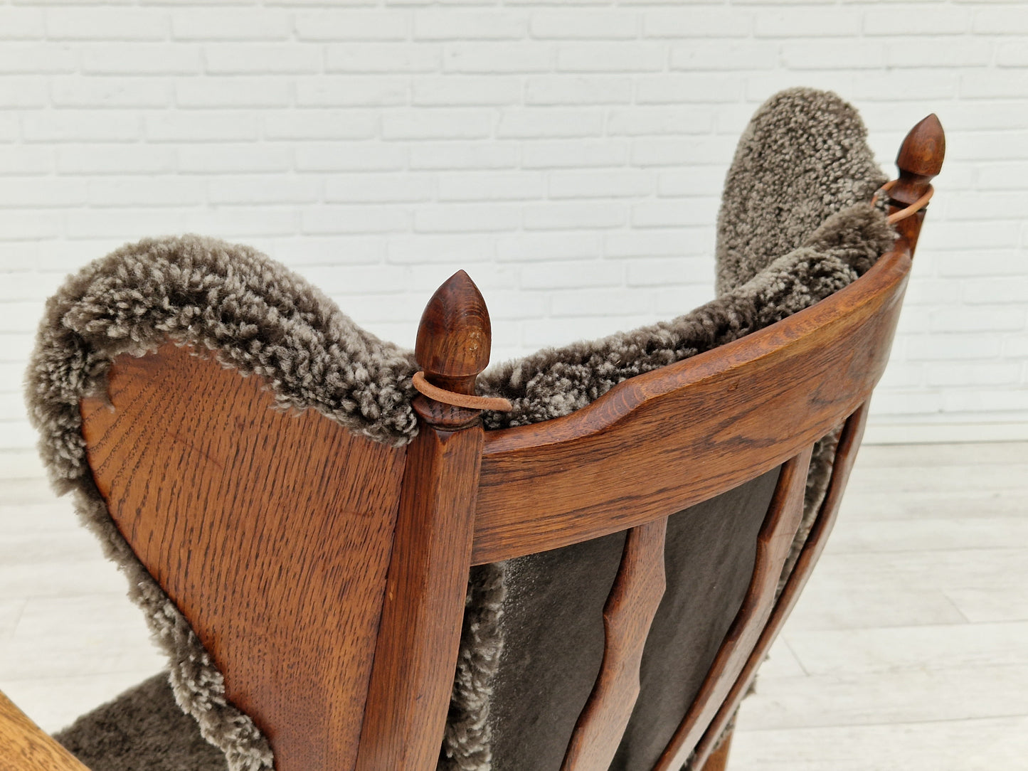 1960s, Danish design, renovated-reupholstered high-back ear flap chair, sheepskin, oak wood