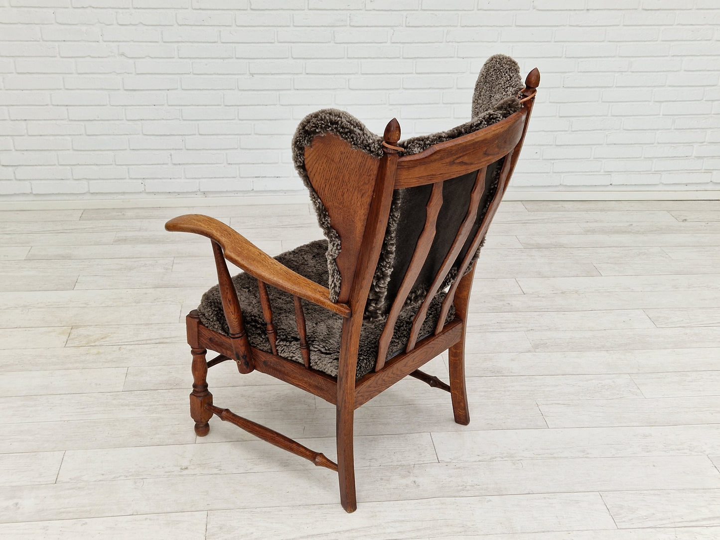 1960s, Danish design, renovated-reupholstered high-back ear flap chair, sheepskin, oak wood