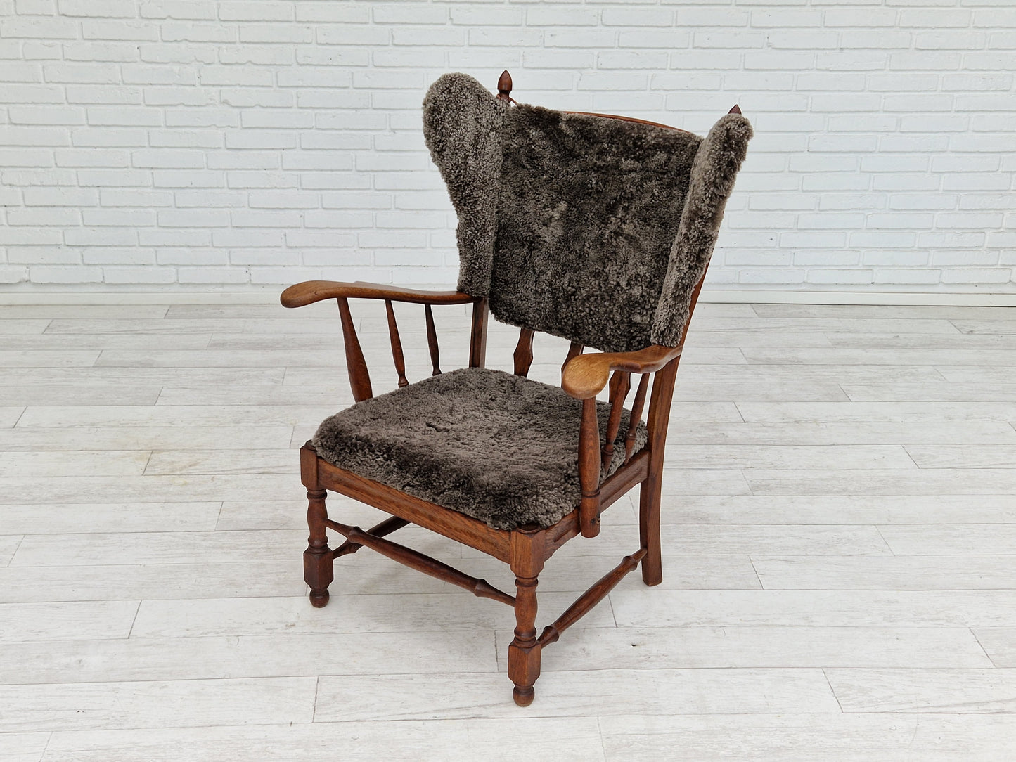 1960s, Danish design, renovated-reupholstered high-back ear flap chair, sheepskin, oak wood