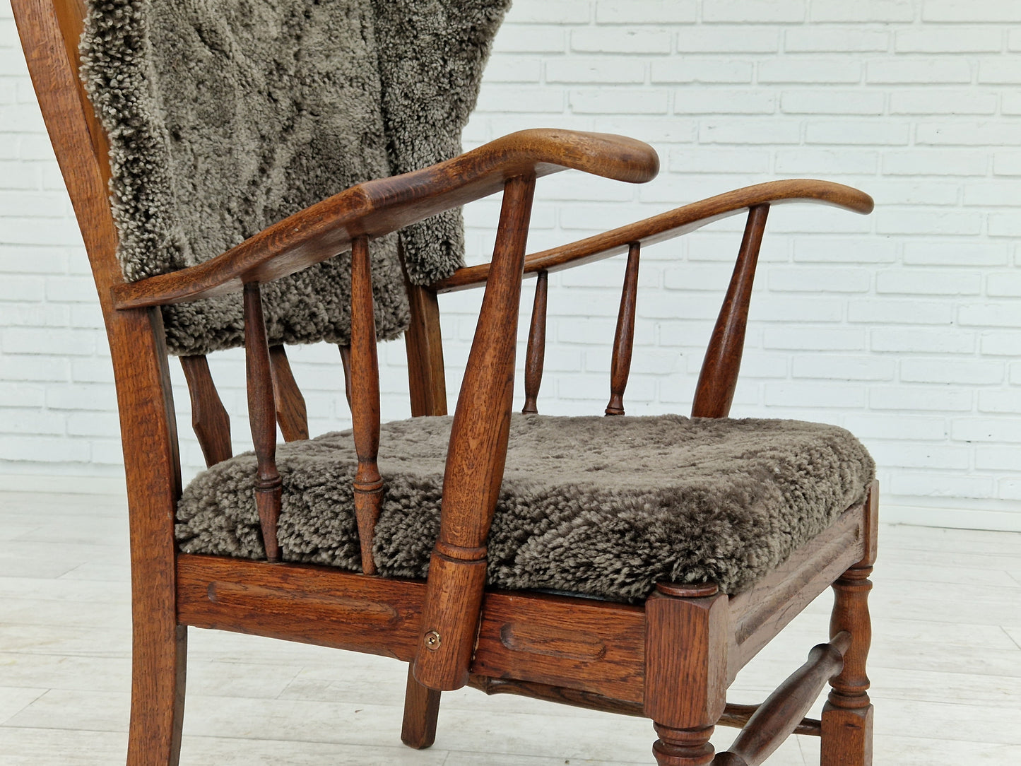 1960s, Danish design, renovated-reupholstered high-back ear flap chair, sheepskin, oak wood