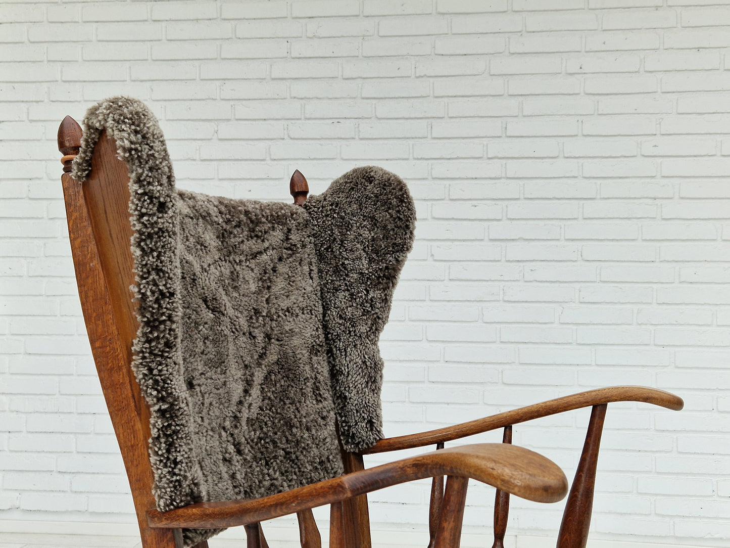 1960s, Danish design, renovated-reupholstered high-back ear flap chair, sheepskin, oak wood