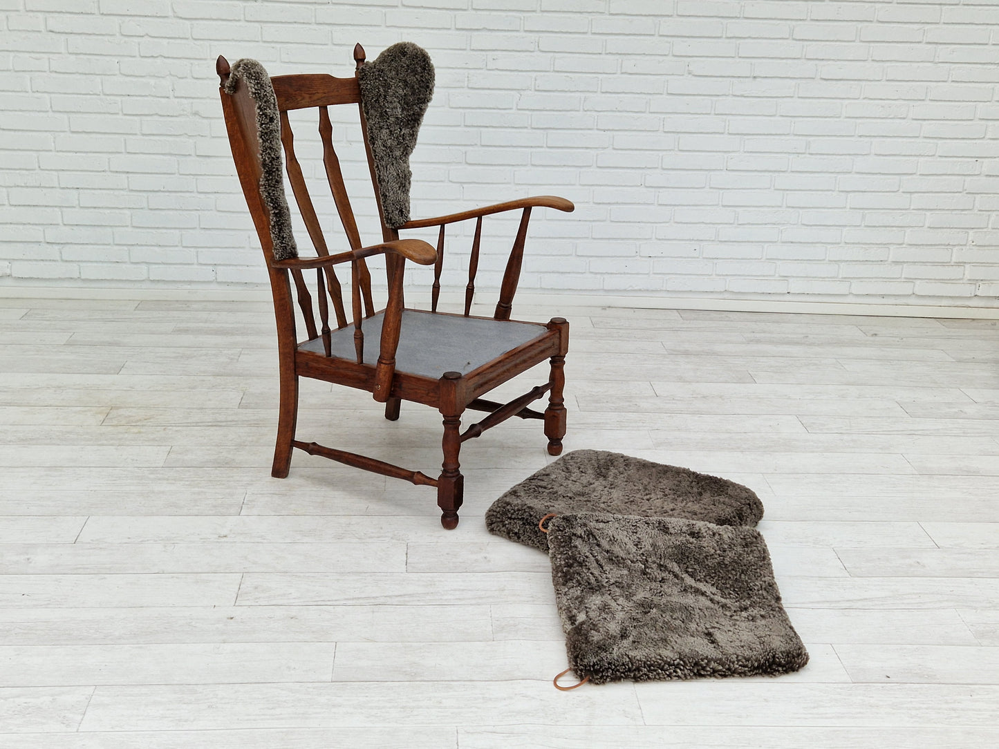 1960s, Danish design, renovated-reupholstered high-back ear flap chair, sheepskin, oak wood