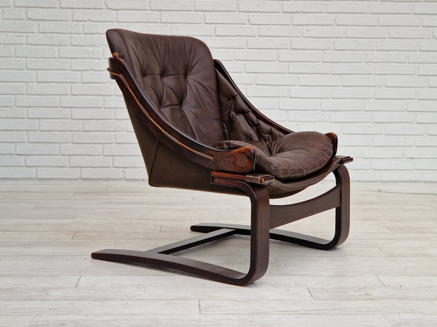 1970s, brown leather lounge chair by Ake Fribytter for Nelo Sweden.