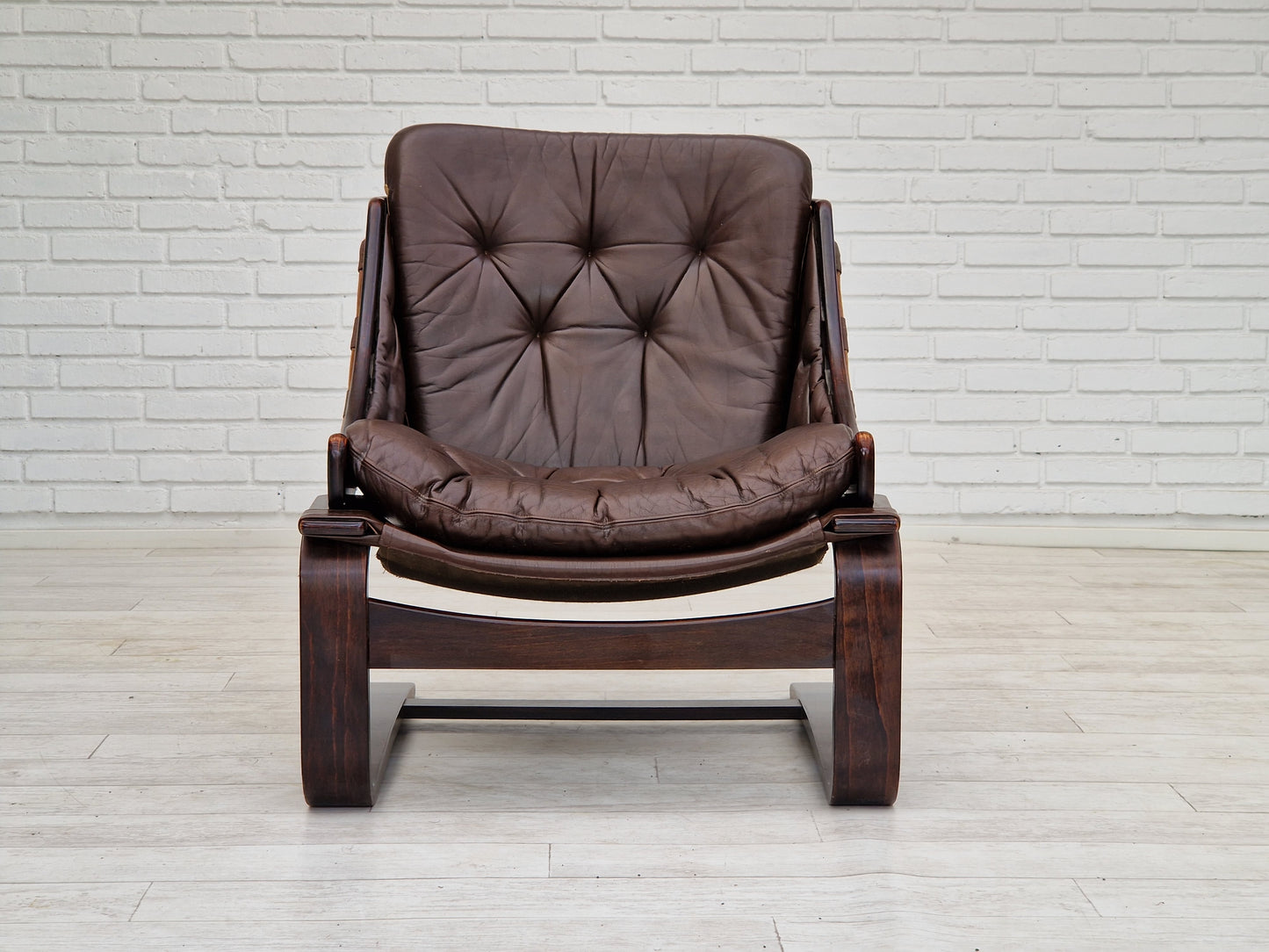 1970s, brown leather lounge chair by Ake Fribytter for Nelo Sweden.