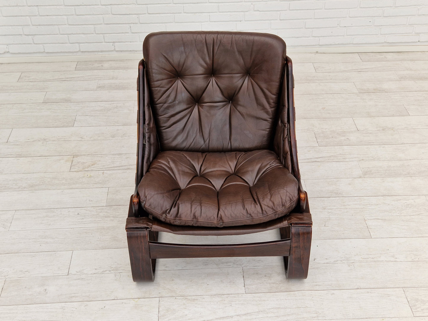 1970s, brown leather lounge chair by Ake Fribytter for Nelo Sweden.