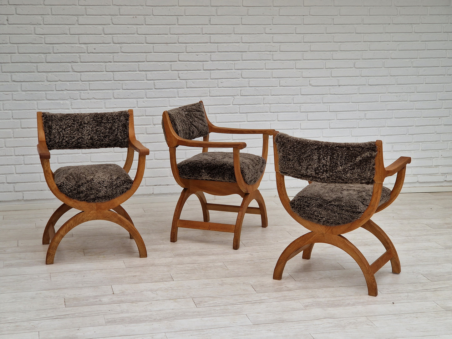 1960s, Danish design by Henning Kjærnulf, chair model "Kurul", sheepskin, oak wood.