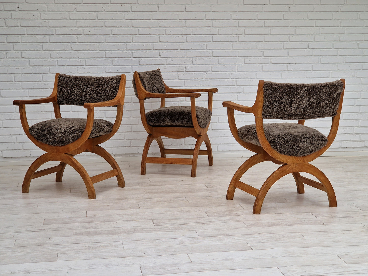 1960s, Danish design by Henning Kjærnulf, chair model "Kurul", sheepskin, oak wood.