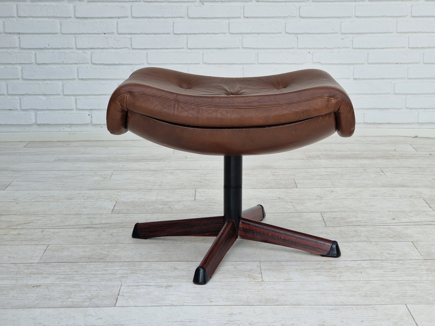 1970s, Swedish design by Göte Möbler Nässjö, swivel footstool in brown leather.