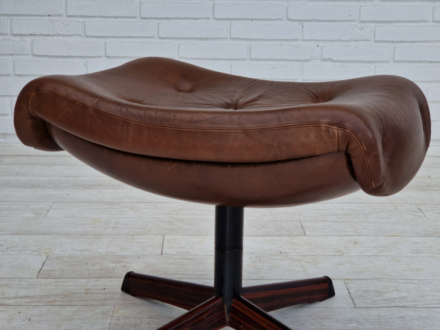 1970s, Swedish design by Göte Möbler Nässjö, swivel footstool in brown leather.