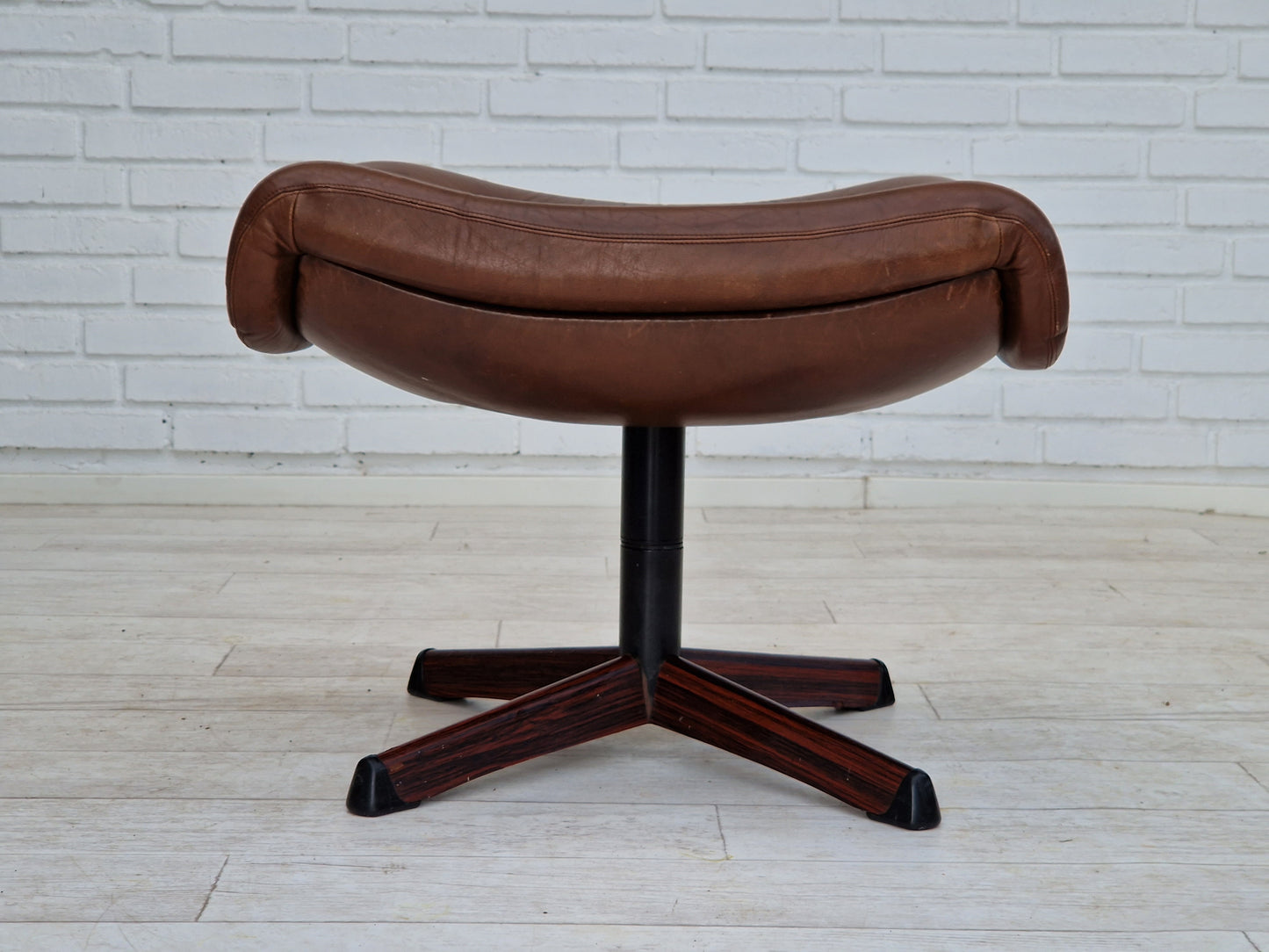 1970s, Swedish design by Göte Möbler Nässjö, swivel footstool in brown leather.