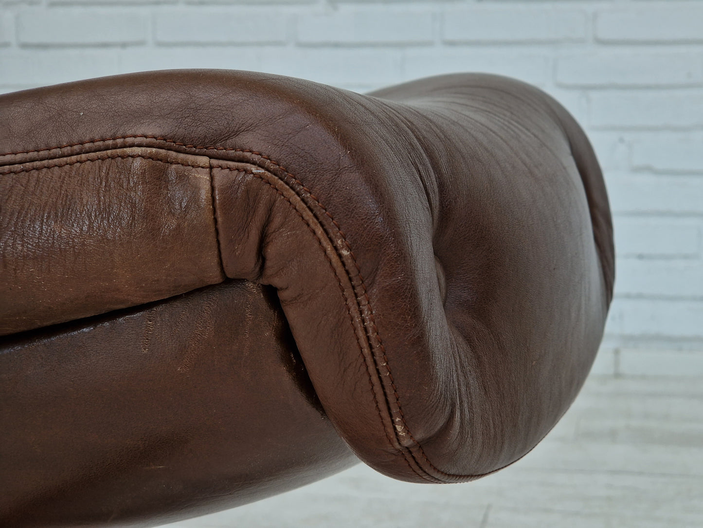 1970s, Swedish design by Göte Möbler Nässjö, swivel footstool in brown leather.