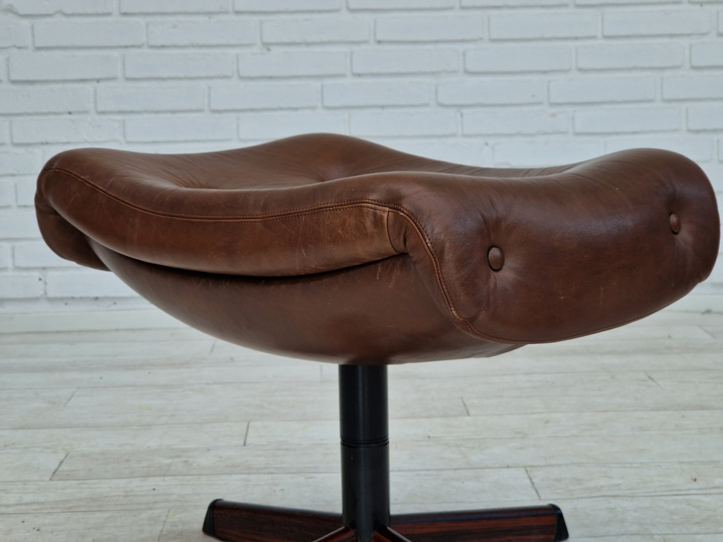 1970s, Swedish design by Göte Möbler Nässjö, swivel footstool in brown leather.