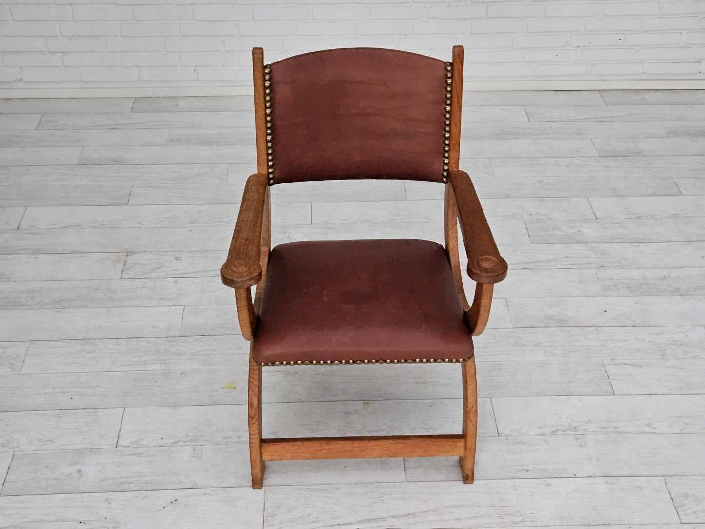 1950s, Danish design, reupholstered armchair, natural brown leather, oak wood.