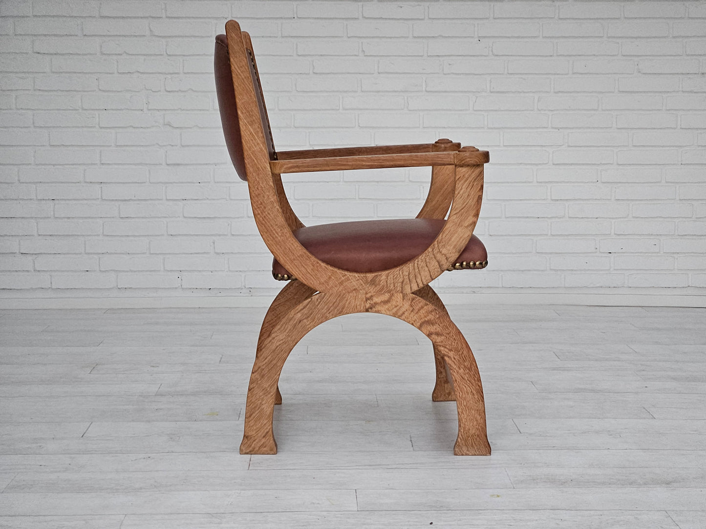 1950s, Danish design, reupholstered armchair, natural brown leather, oak wood.