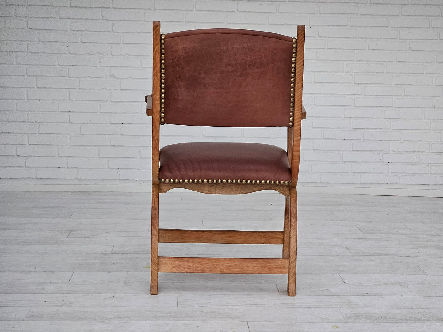 1950s, Danish design, reupholstered armchair, natural brown leather, oak wood.