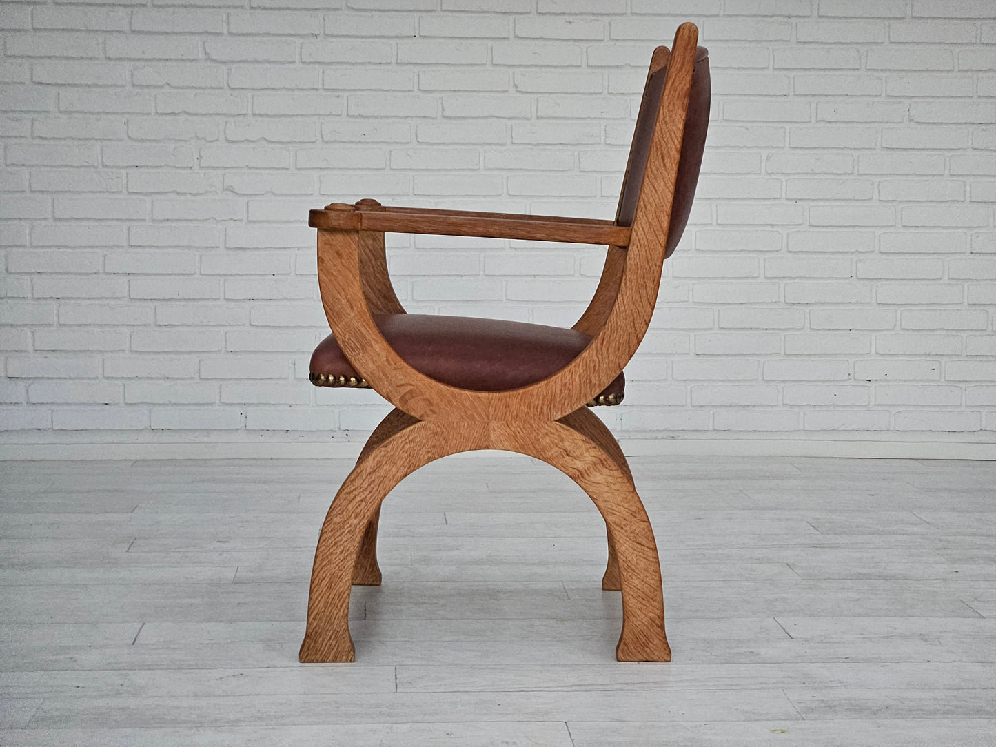 1950s, Danish design, reupholstered armchair, natural brown leather, oak wood.