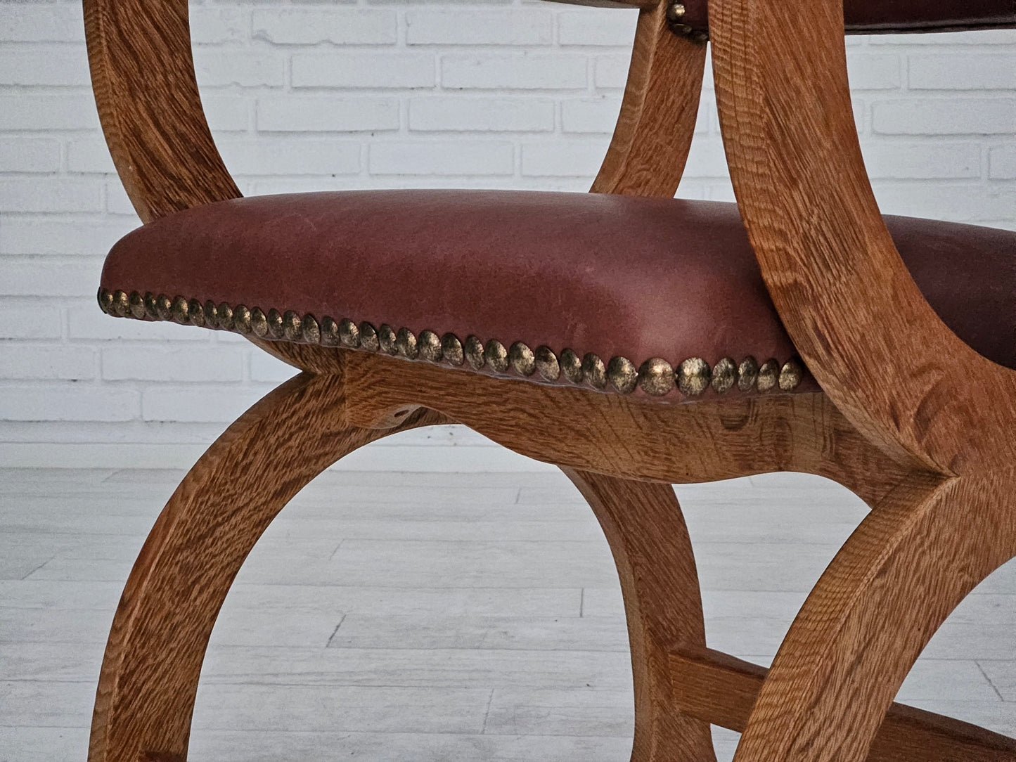 1950s, Danish design, reupholstered armchair, natural brown leather, oak wood.