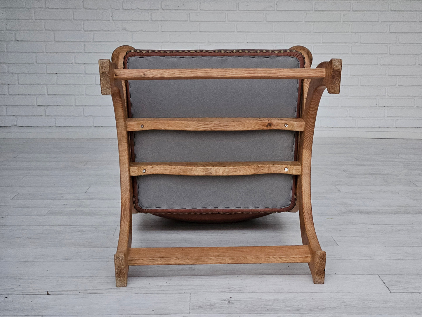 1950s, Danish design, reupholstered armchair, natural brown leather, oak wood.