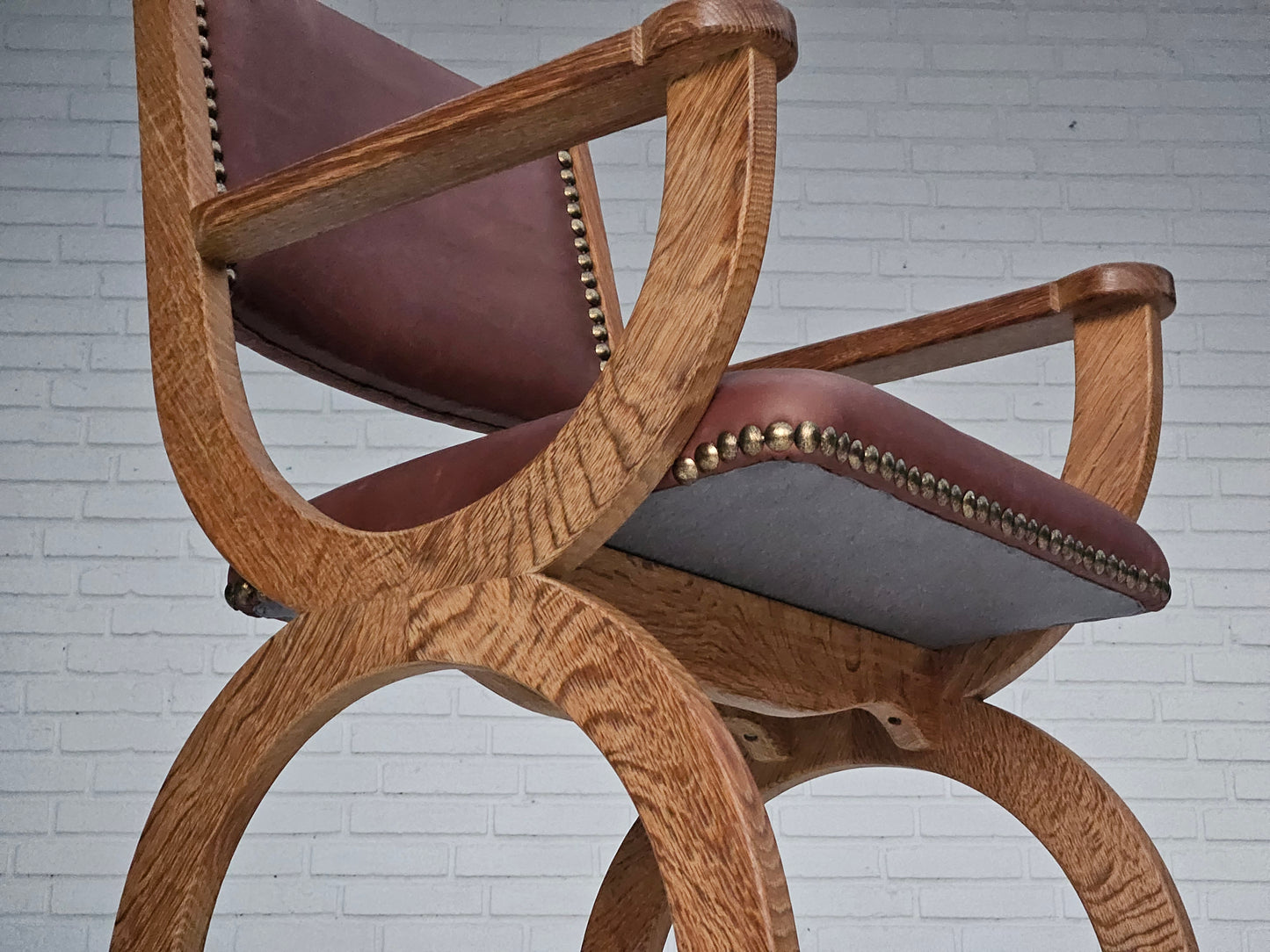 1950s, Danish design, reupholstered armchair, natural brown leather, oak wood.