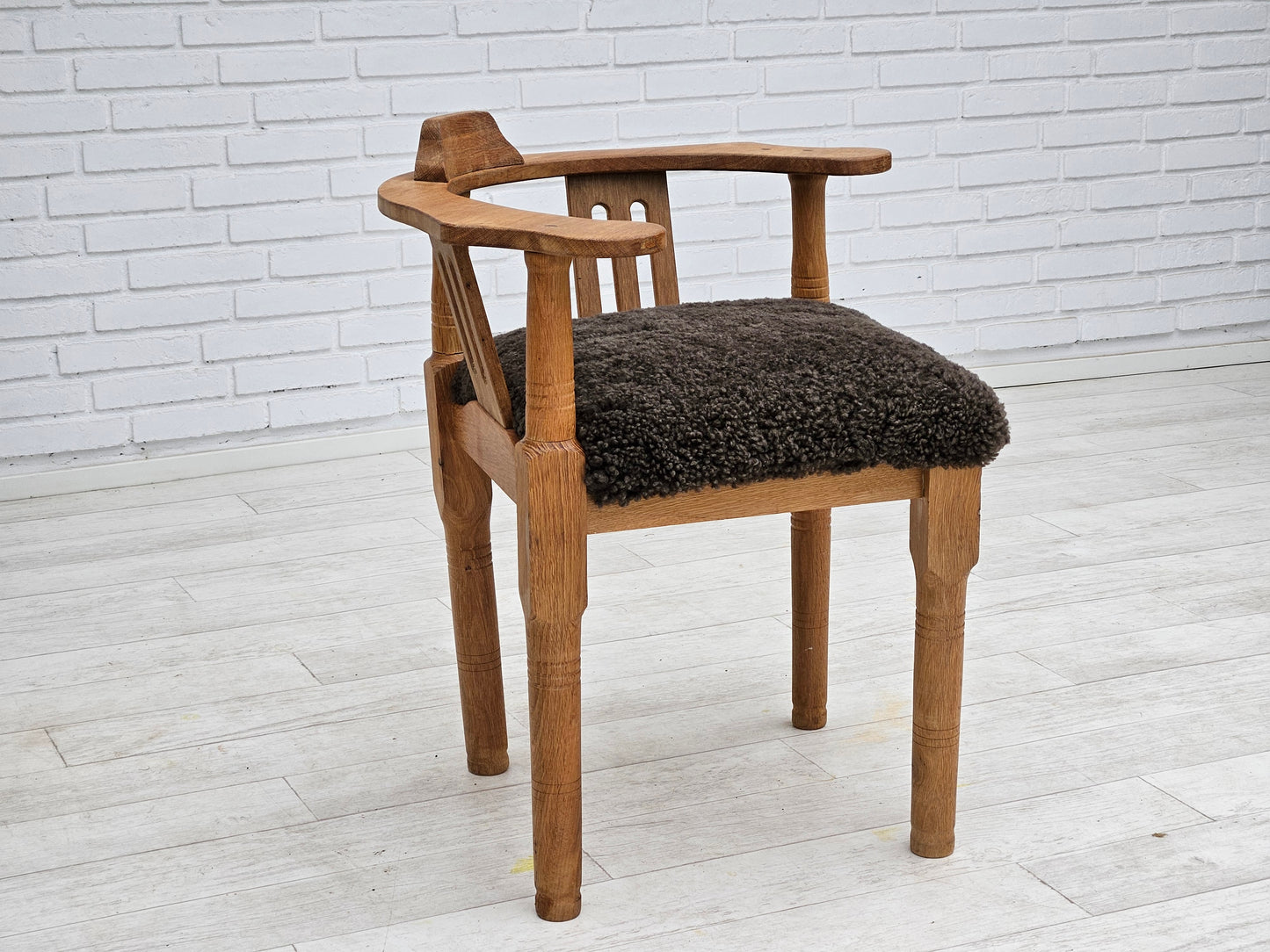 1950s, Danish design, reupholstered armchair, New Zealand sheepskin, oak wood.