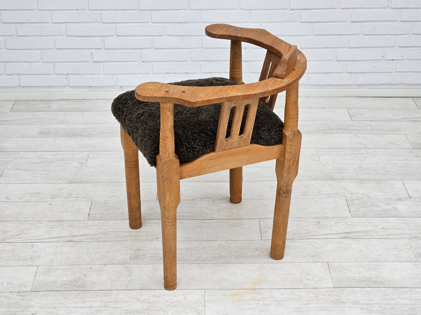 1950s, Danish design, reupholstered armchair, New Zealand sheepskin, oak wood.